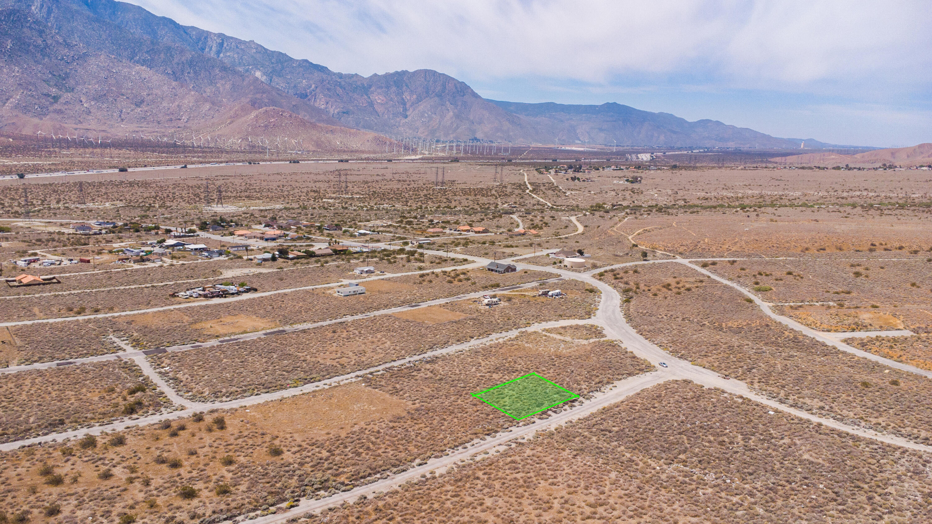 a view of an ocean and a mountain