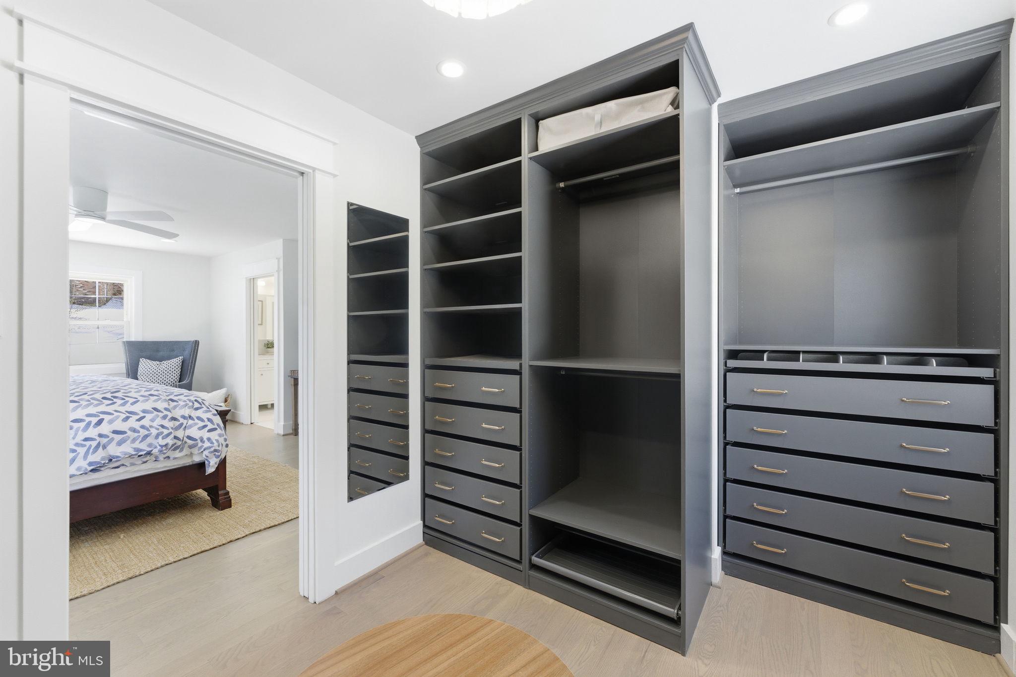 8615 Kerry Lane Springfield, VA 22152 - Photo 21 of 50 a view of walk in closet with clothes and shoes