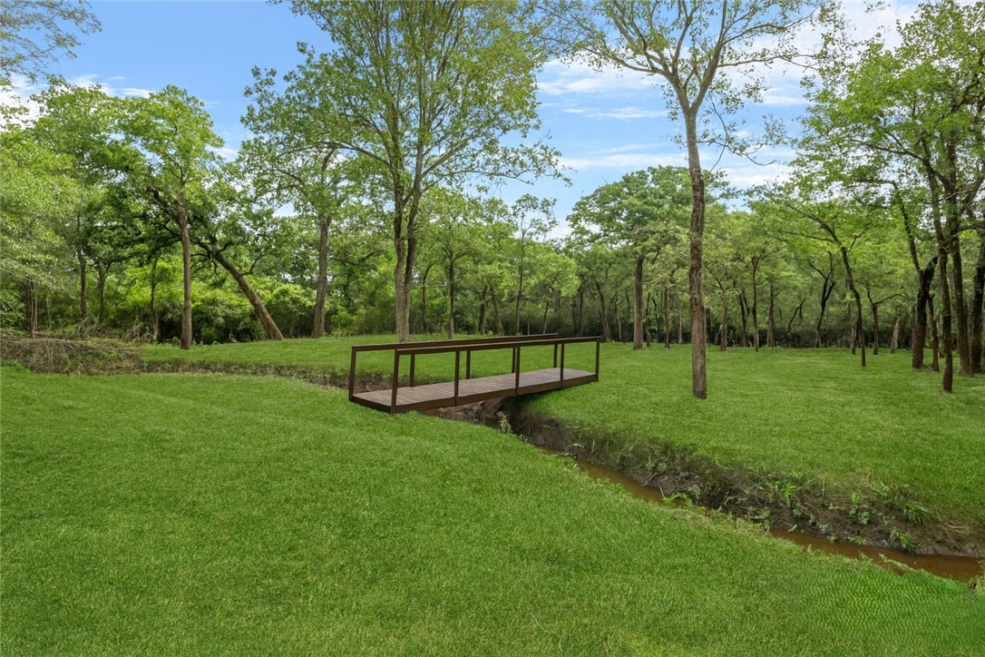 12796 South Fork Road Iola, TX 77861 - Photo 23 of 28 Back yard with bridge over creek 1
