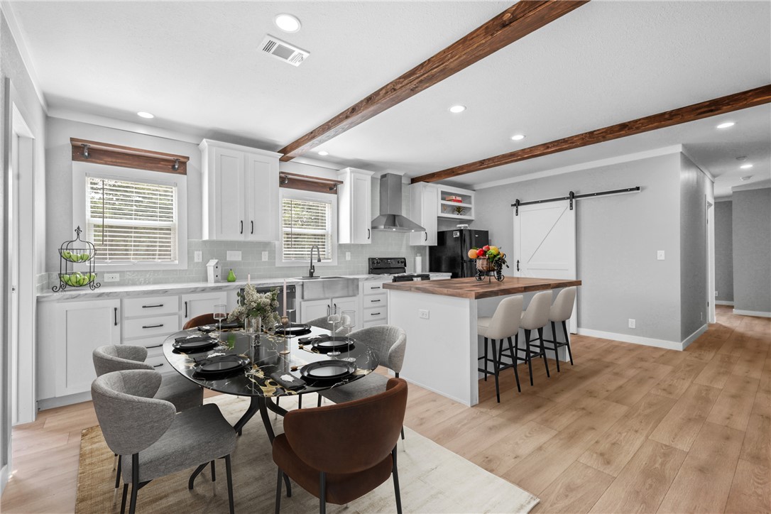 12796 South Fork Road Iola, TX 77861 - Photo 6 of 28 Dining area, virtually staged