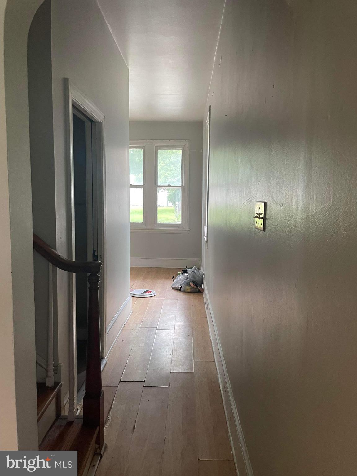 60 West 3rd Street Pottstown, PA 19464 - Photo 9 of 13 en empty room with windows and wooden floor