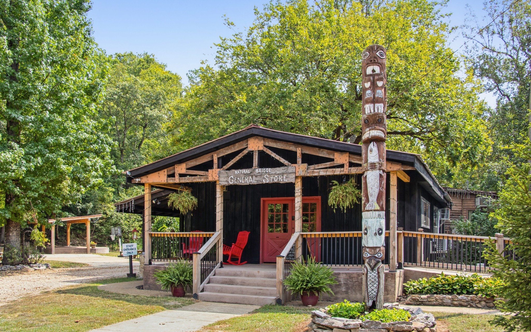 299 Natural Bridge Park Road Waynesboro, TN 38485 - Photo 24 of 63 a front view of a house with garden