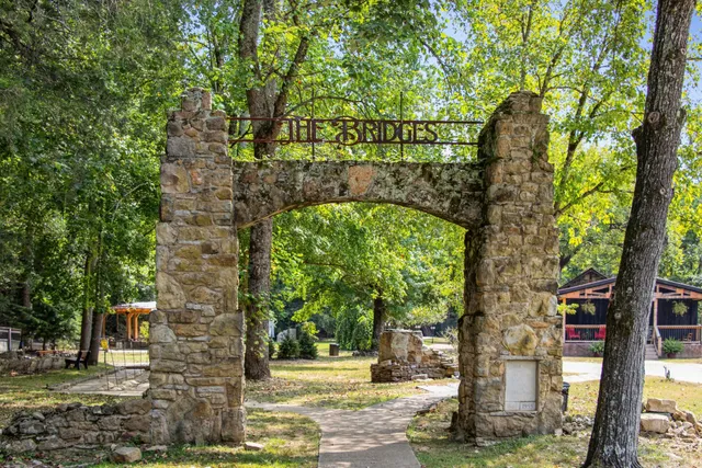 a view of house with yard and seating area