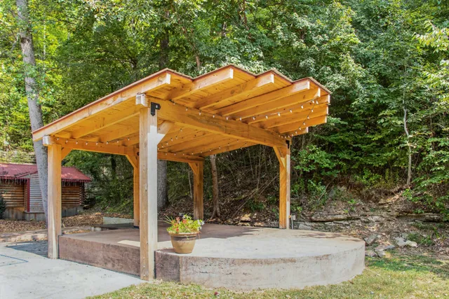 a view of a swimming pool with a deck