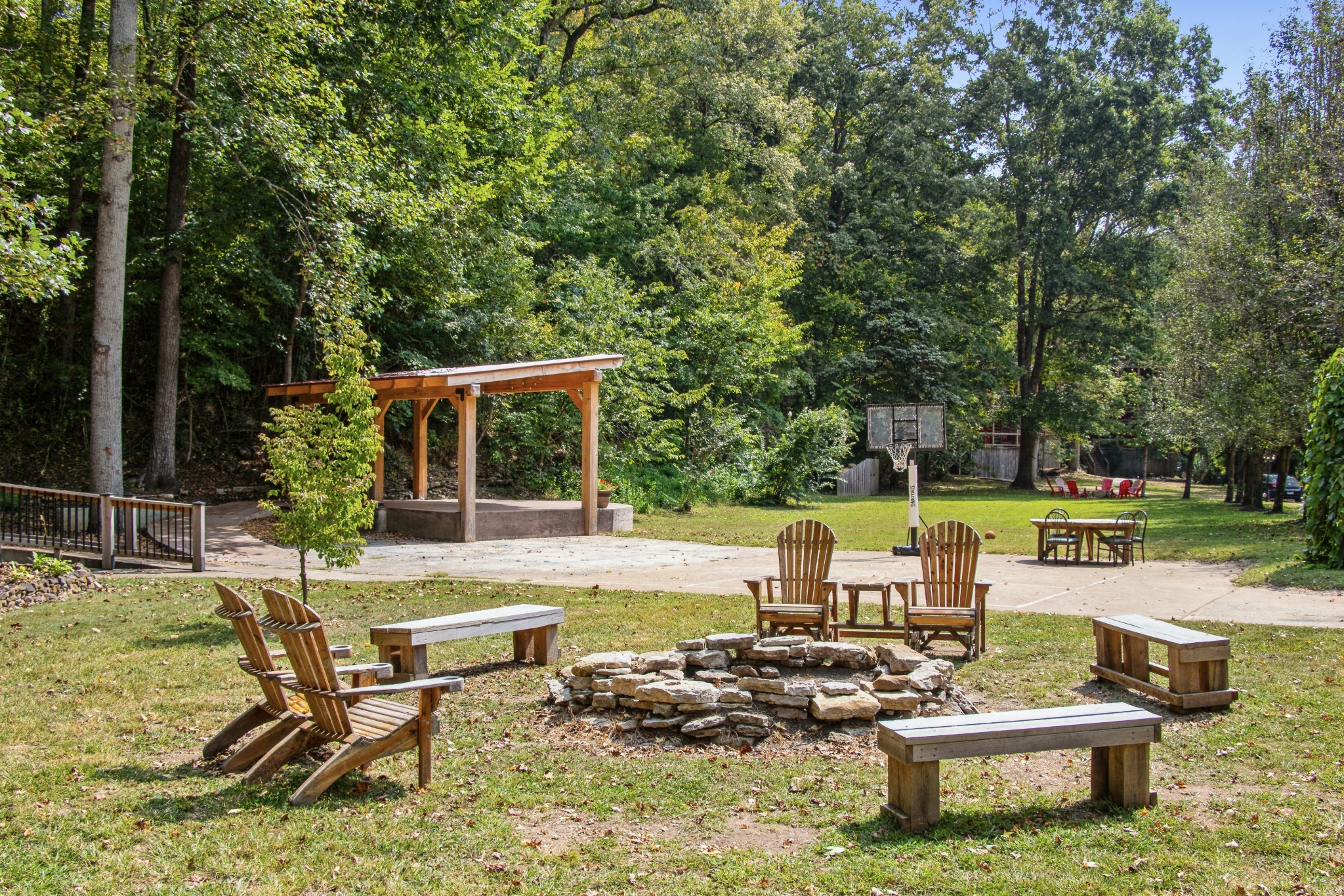 299 Natural Bridge Park Road Waynesboro, TN 38485 - Photo 33 of 63 a view of a house with backyard sitting area and garden