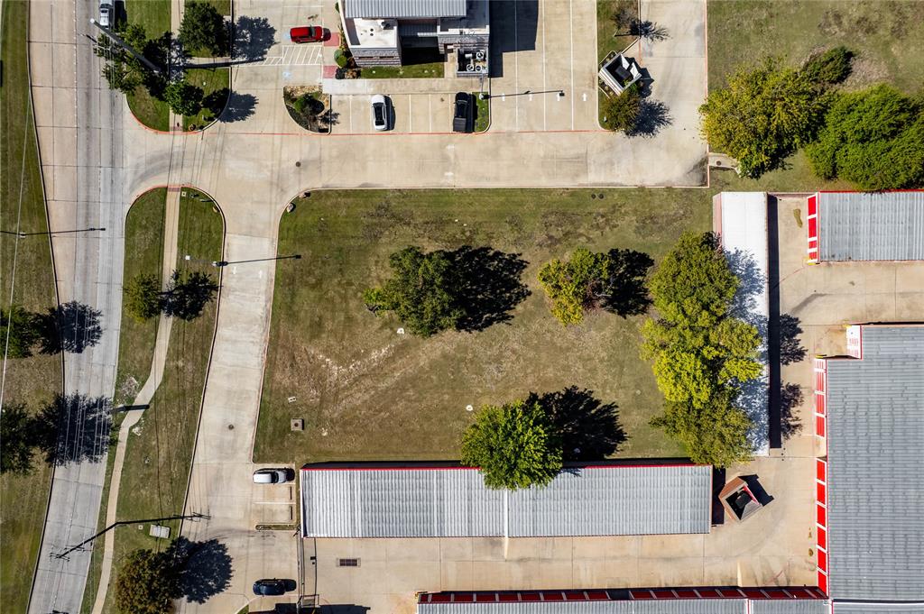 2401 Arapaho Road Garland, TX 75044 - Photo 10 of 15 an aerial view of a house with a swimming pool