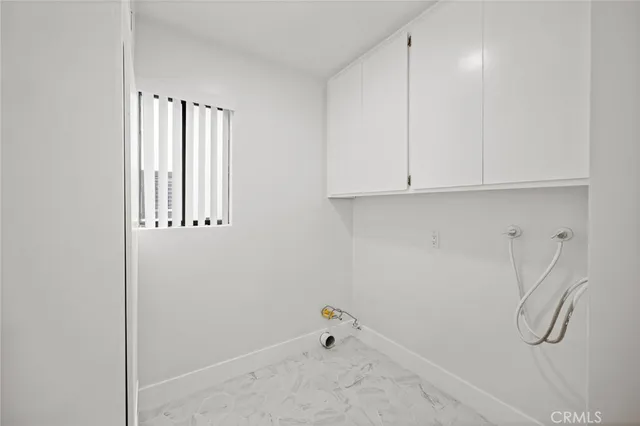 a view of small space with racks on the wall