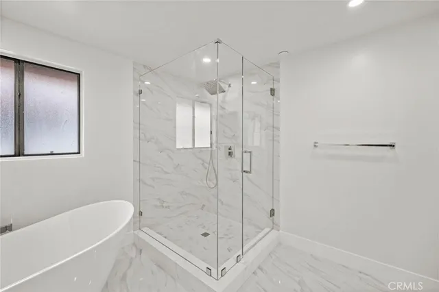 a bathroom with a double vanity sink toilet and a mirror