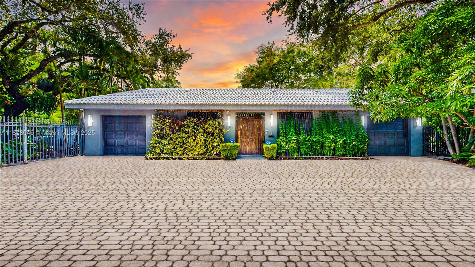 a front view of a house with garden
