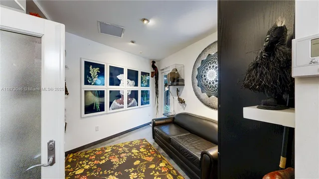 a bathroom with a toilet and a sink