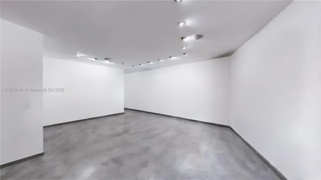 a bed room with furniture and a chandelier