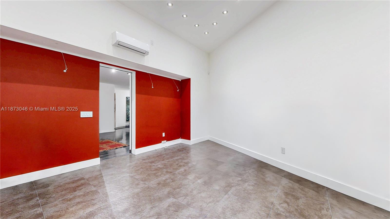 2101 Tigertail Avenue Miami, FL 33133 - Photo 42 of 92 an empty room with wooden floor