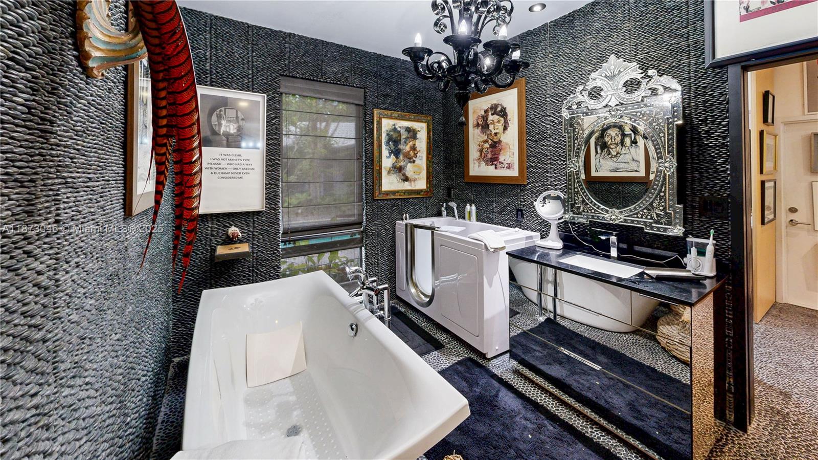 2101 Tigertail Avenue Miami, FL 33133 - Photo 59 of 92 a bathroom with a double vanity sink and a mirror