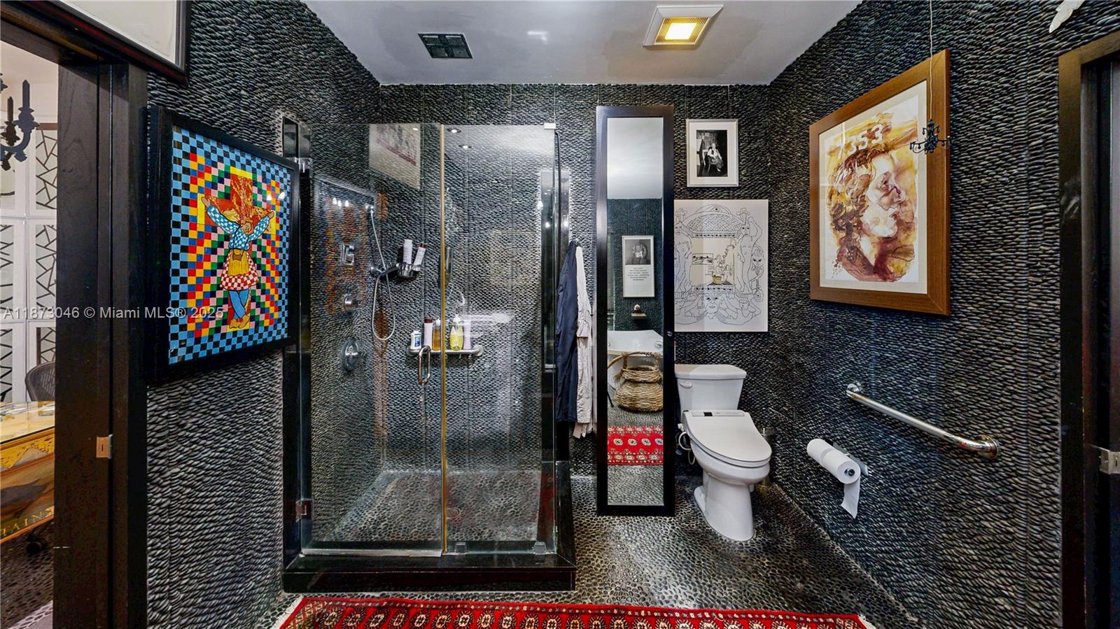 2101 Tigertail Avenue Miami, FL 33133 - Photo 60 of 92 a bathroom with a toilet and a shower