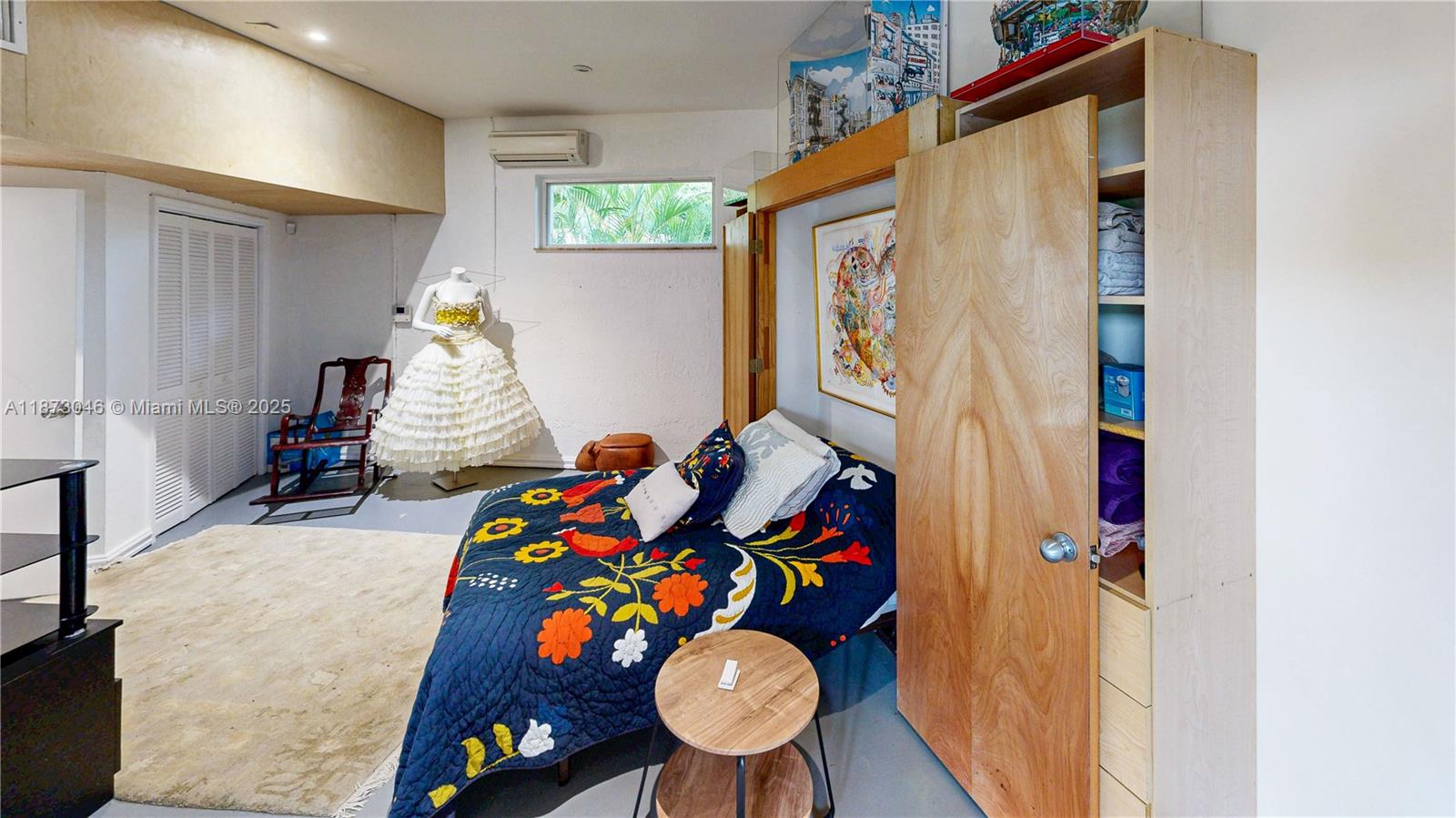 2101 Tigertail Avenue Miami, FL 33133 - Photo 8 of 92 a living room with furniture and wooden floor