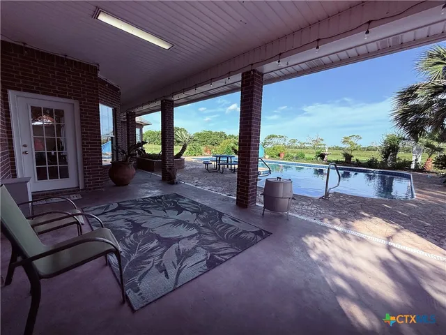 a view of a sitting area with furniture