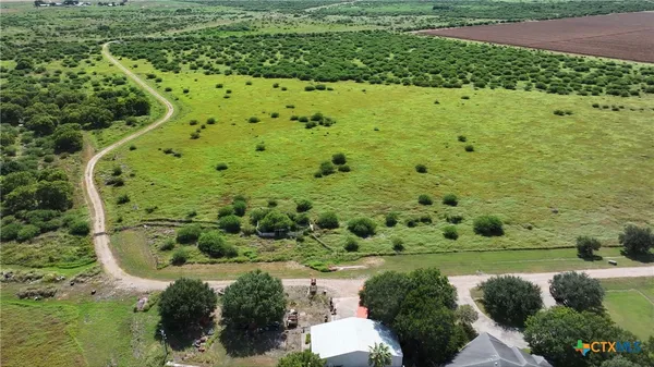 a view of an ocean and a houses