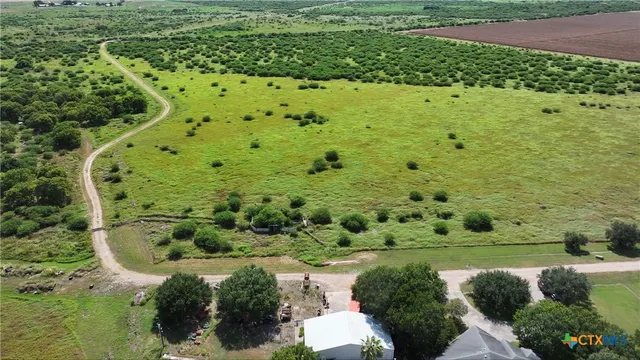 a view of an ocean and a houses