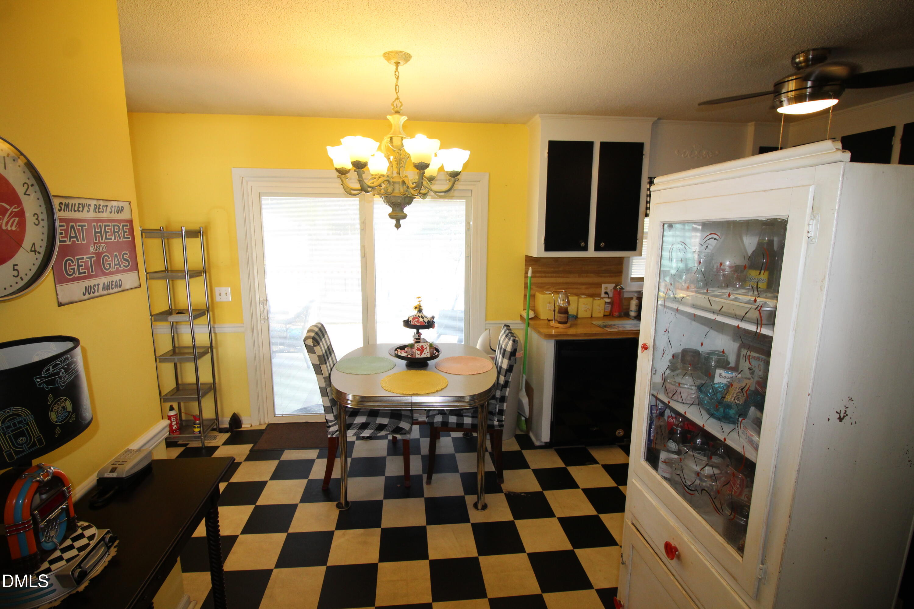 56 Ash Street Coats, NC 27521 - Photo 27 of 28 a view of a livingroom with furniture and a window