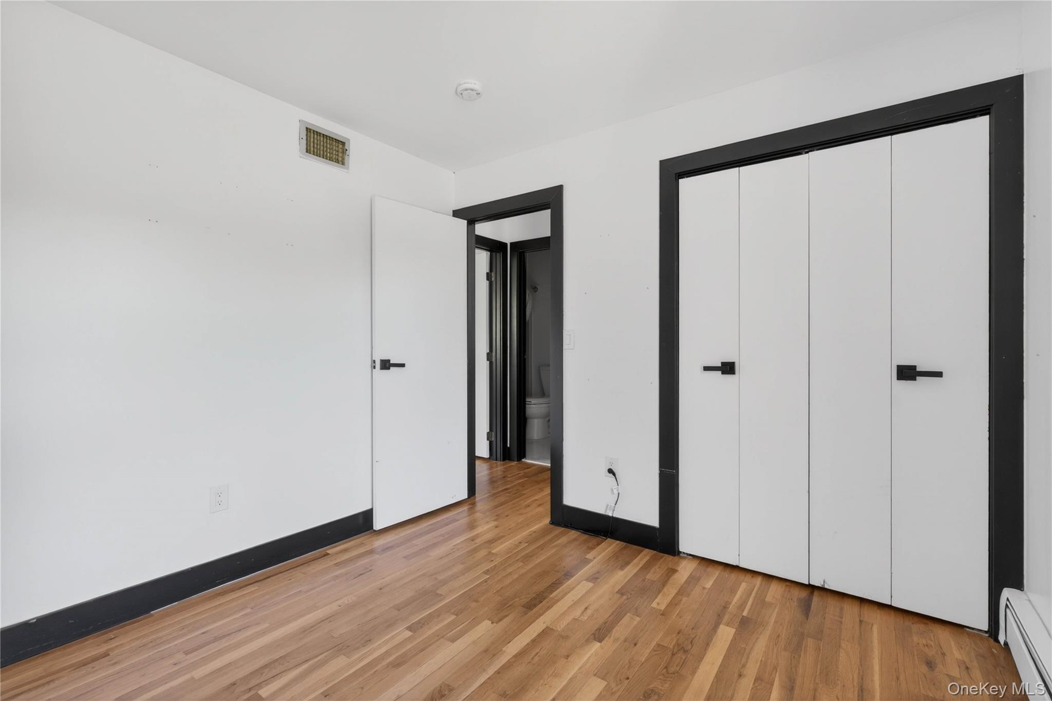 40 Felter Hill Road Monroe, NY 10950 - Photo 16 of 37 a view of a hallway with wooden floor and closet