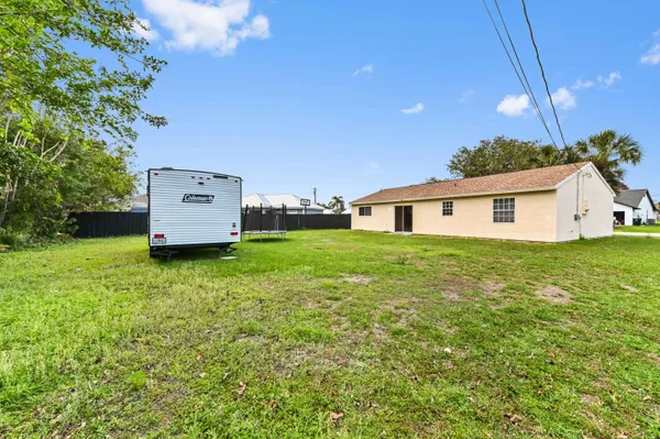 a view of a house with a big yard