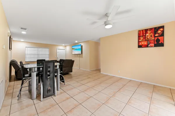 a view of a dining room with furniture
