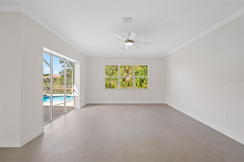 629 Sawgrass Bridge Road Venice, FL 34292 - Photo 12 of 36 an empty room with windows