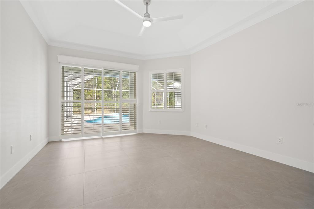 629 Sawgrass Bridge Road Venice, FL 34292 - Photo 15 of 36 an empty room with windows and closet