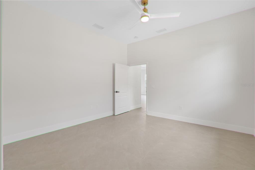 629 Sawgrass Bridge Road Venice, FL 34292 - Photo 25 of 36 an empty room with a outdoor space