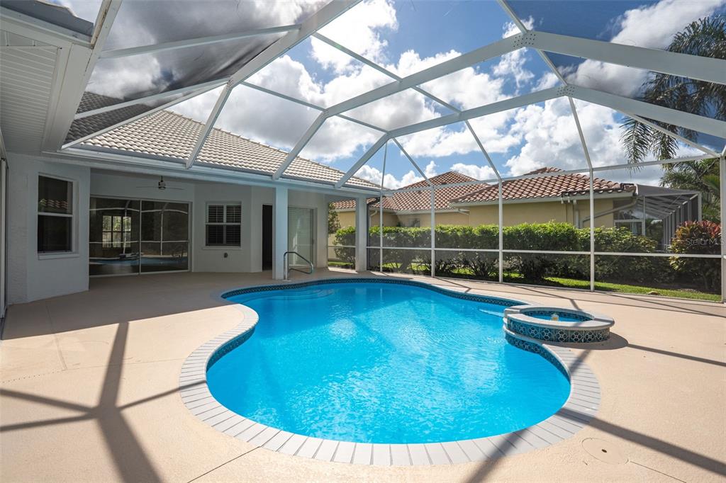 629 Sawgrass Bridge Road Venice, FL 34292 - Photo 30 of 36 a view of a swimming pool with a patio