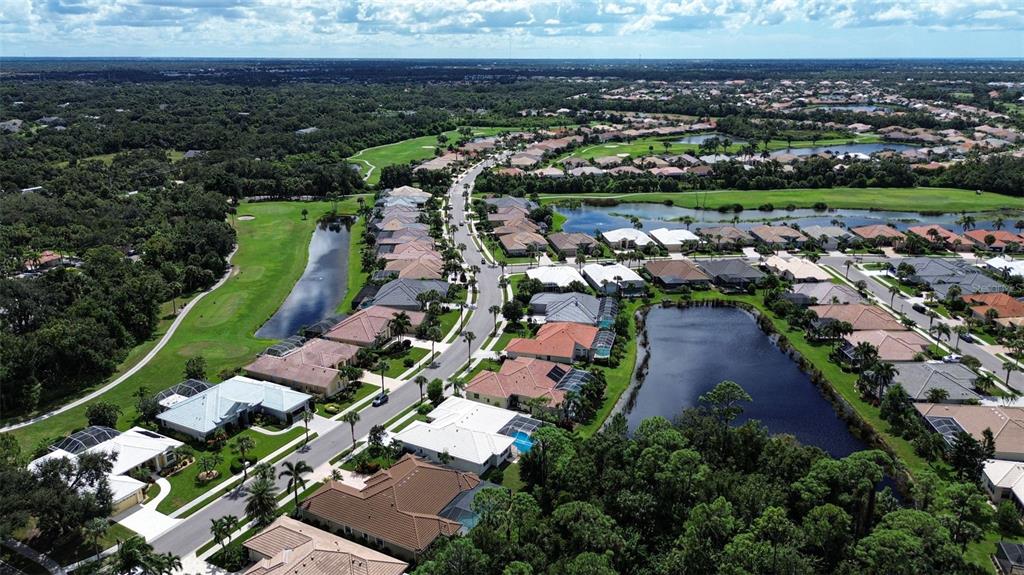 629 Sawgrass Bridge Road Venice, FL 34292 - Photo 34 of 36 an aerial view of a city