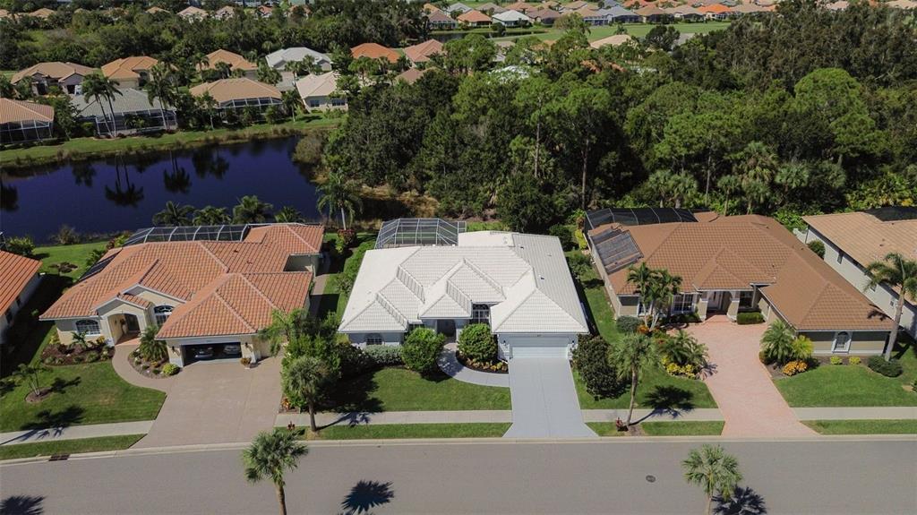 629 Sawgrass Bridge Road Venice, FL 34292 - Photo 35 of 36 an aerial view of a house with a garden