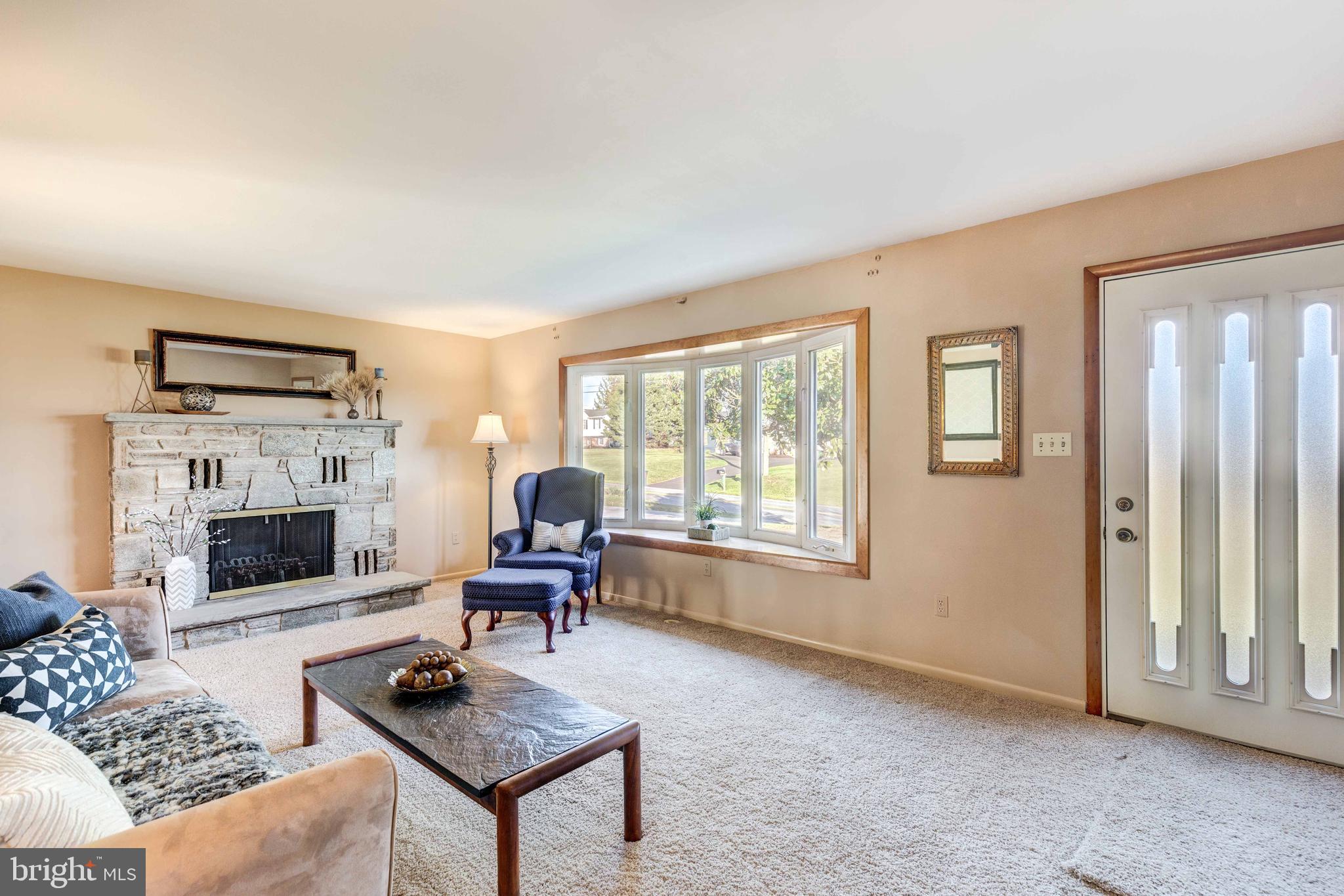 703 Stone Road Westminster, MD 21158 - Photo 14 of 41 Living Room with Wood Burning Fireplace