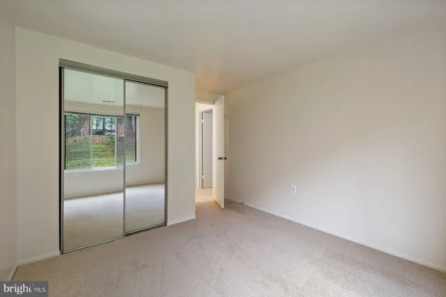 a view of an empty room and window