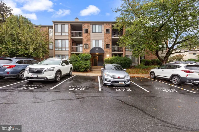a parked cars parked in front of a house