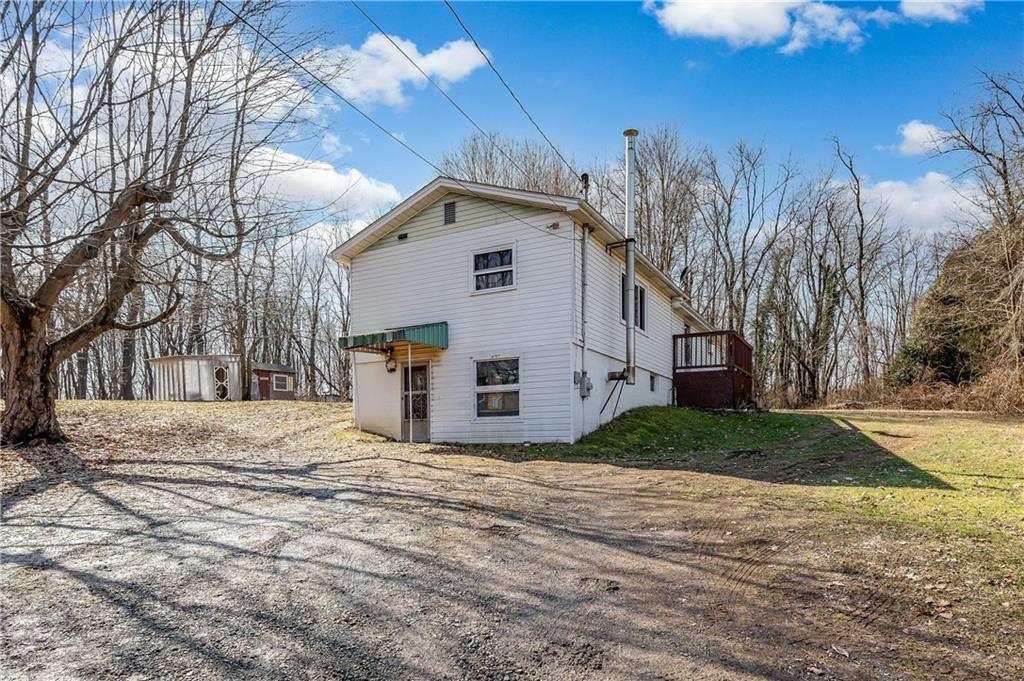 184 Oak Ridge Drive Butler, PA 16002 - Photo 2 of 16 a view of a white house with a yard
