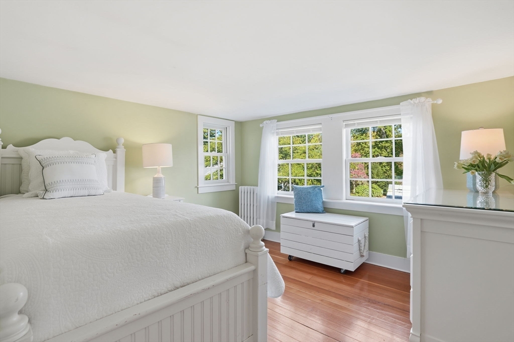 178 Main Street Plympton, MA 02367 - Photo 13 of 37 a bedroom with a large bed and a large window