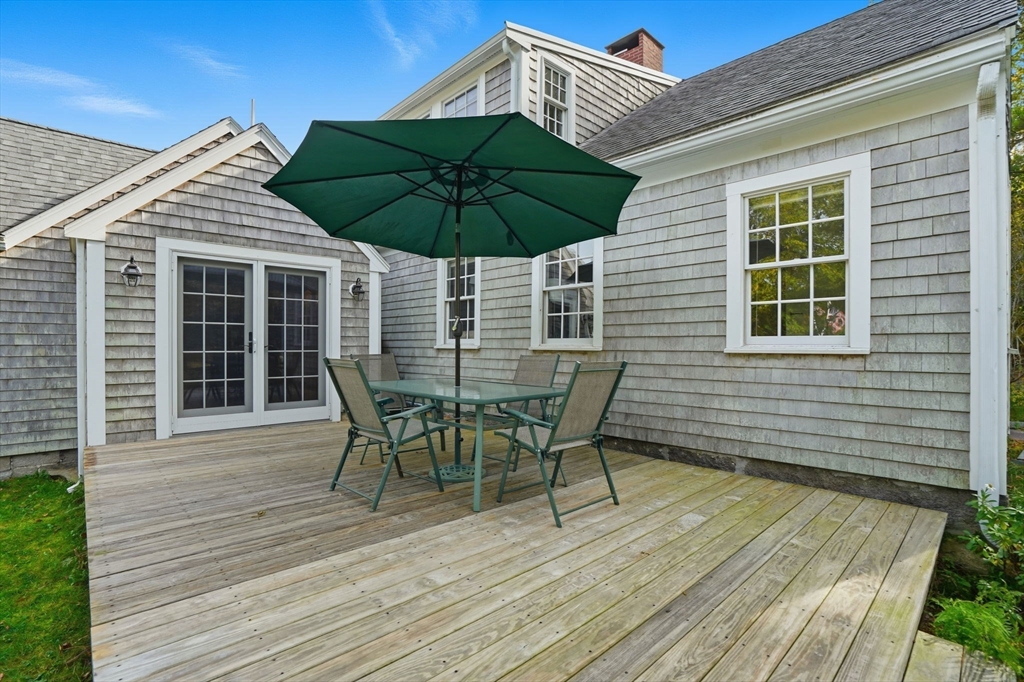 178 Main Street Plympton, MA 02367 - Photo 19 of 37 a patio with table and chairs