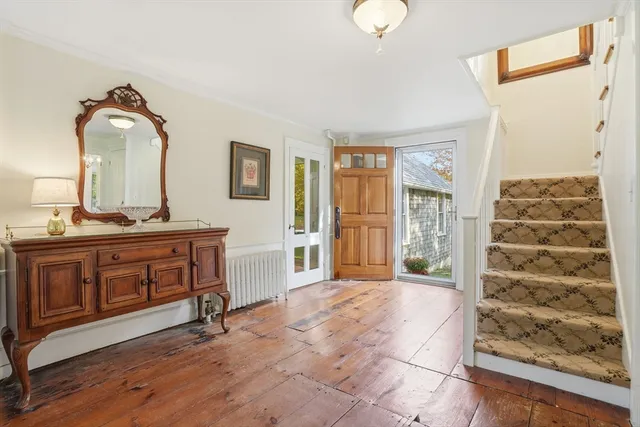 a view of hall way with mirror