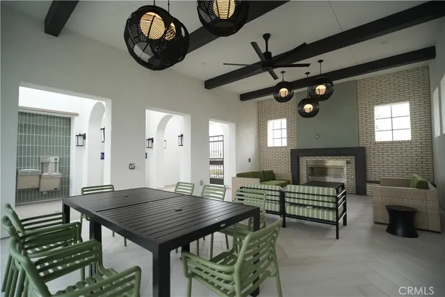 a view of a livingroom with furniture and a table