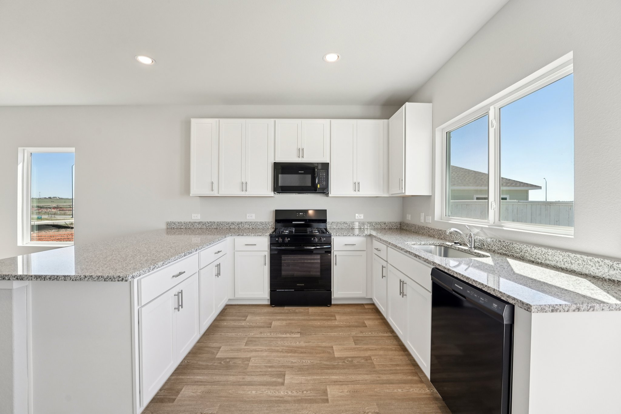 136 Summer Drive Elgin, TX 78621 - Photo 7 of 35 Light & Bright Open Concept Kitchen