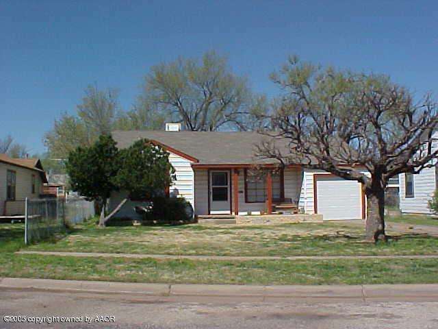 4126 South Tyler Street Amarillo, TX 79110 - Photo 1 of 1 a front view of a house with garden