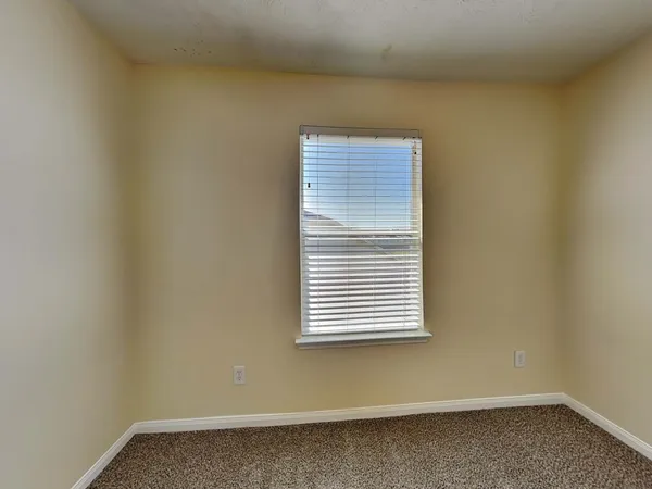 a view of a small space with a window