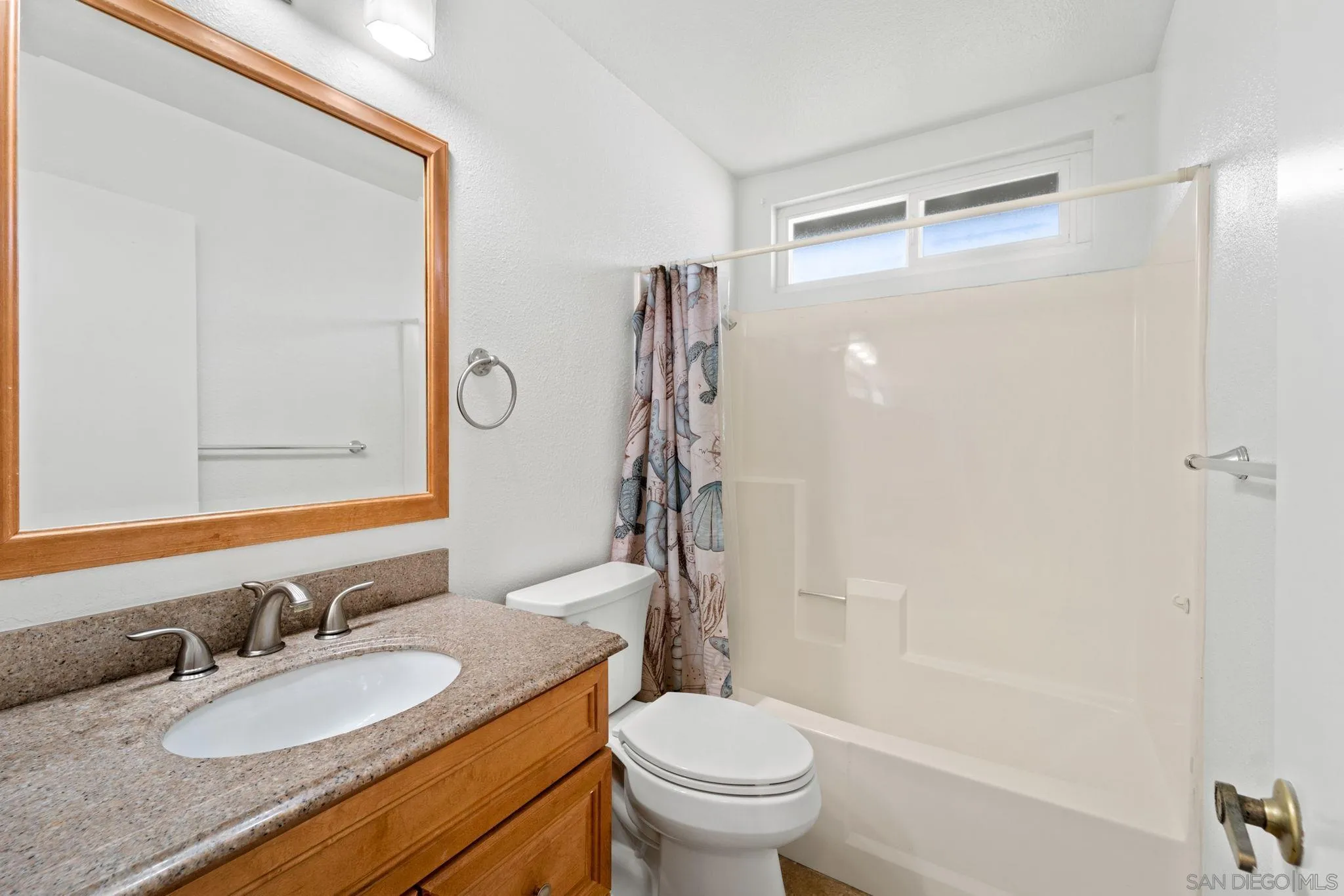 10174 West Glendon Circle Santee, CA 92071 - Photo 20 of 41 a bathroom with a granite countertop sink toilet and shower