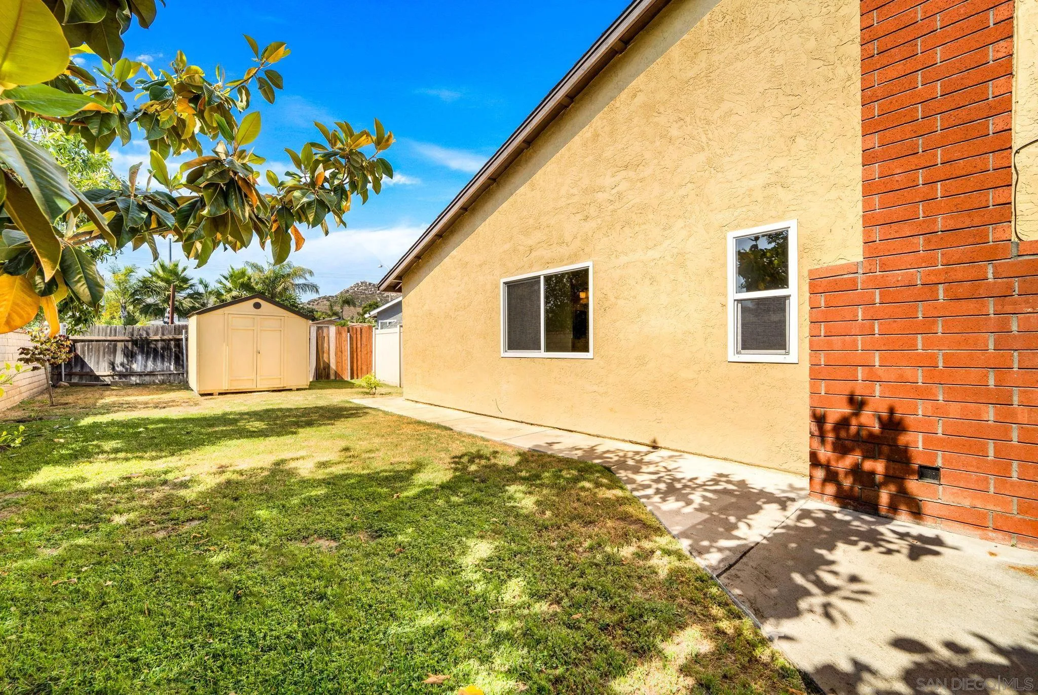 10174 West Glendon Circle Santee, CA 92071 - Photo 22 of 41 a view of a house with a backyard