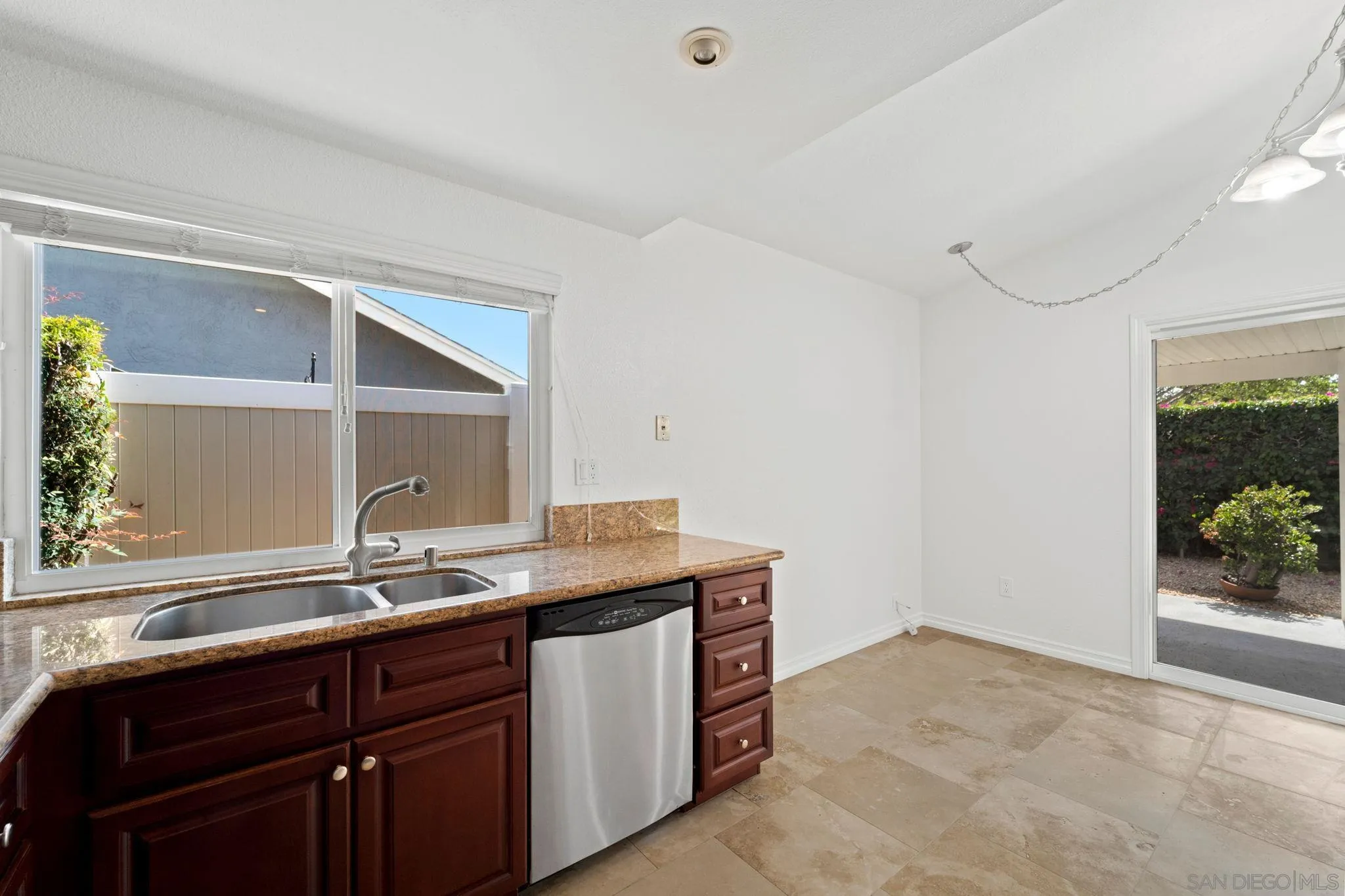 10174 West Glendon Circle Santee, CA 92071 - Photo 33 of 41 a bathroom with a granite countertop sink and a mirror
