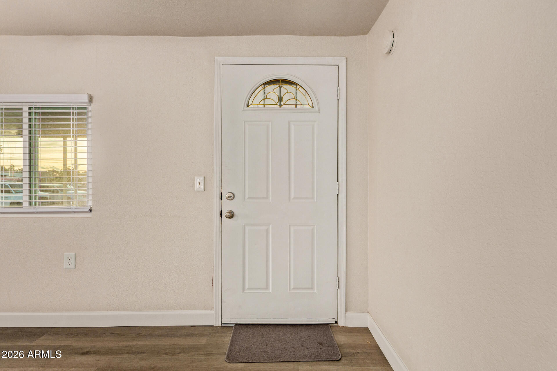 400 West Baseline Road, Unit 312 Tempe, AZ 85283 - Photo 9 of 32 a view of entryway with wooden floor