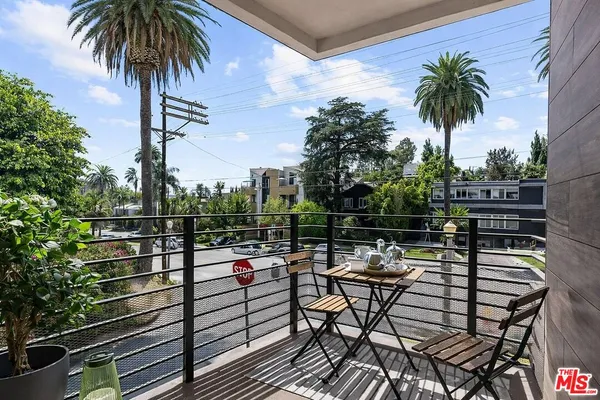 a view of a terrace with furniture