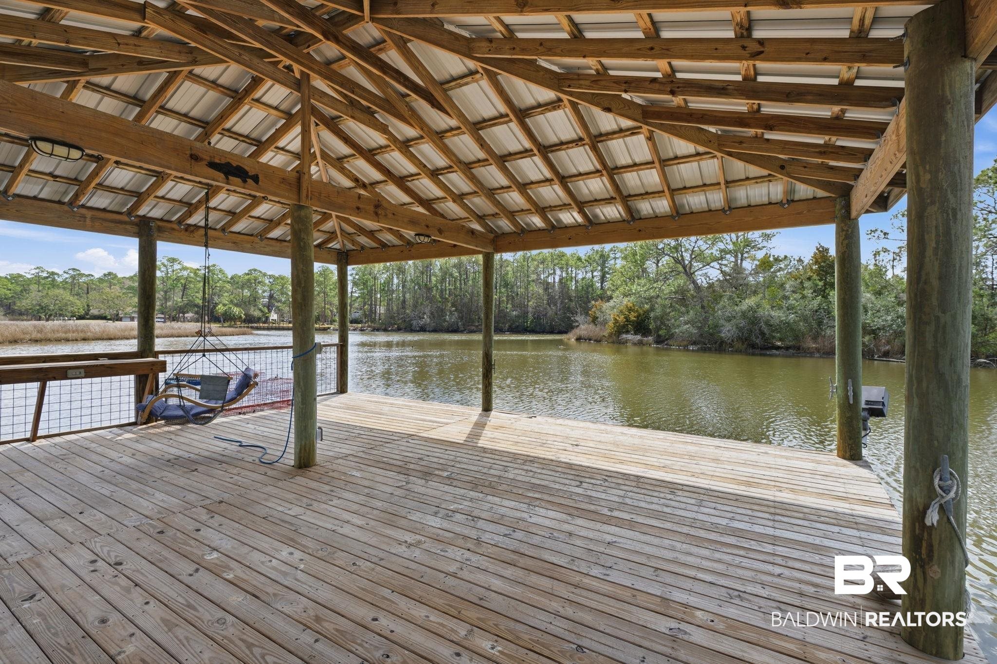 15025 Bellingrath Road Coden, AL 36523 - Photo 14 of 79 Dock featuring a water view and view of scattered trees