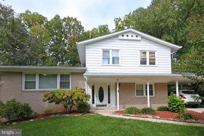 13020 Tamarack Road Silver Spring, MD 20904 - Photo 1 of 25 a front view of a house with garden